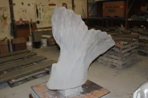 custom public art precast concrete fish tail plaza art