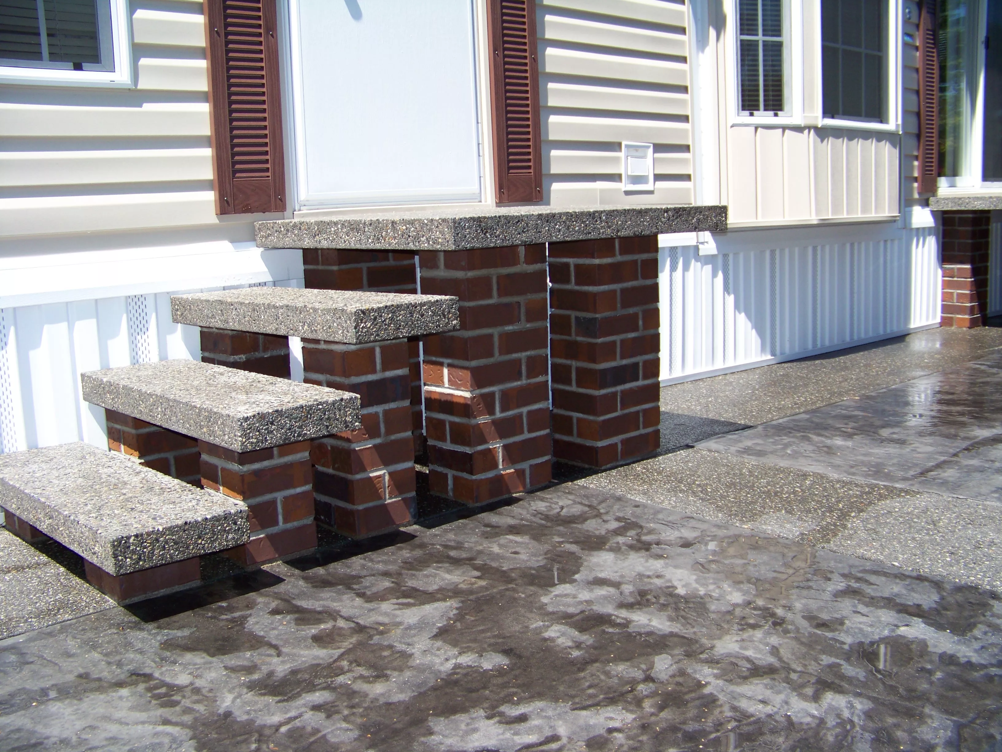 Custom black pigment precast concrete landing and stair treads — Vancouver BC