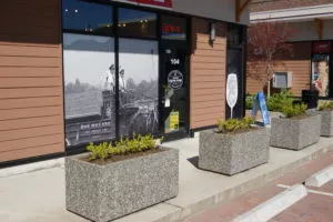 Rectangular precast concrete exposed aggregate barrier planters