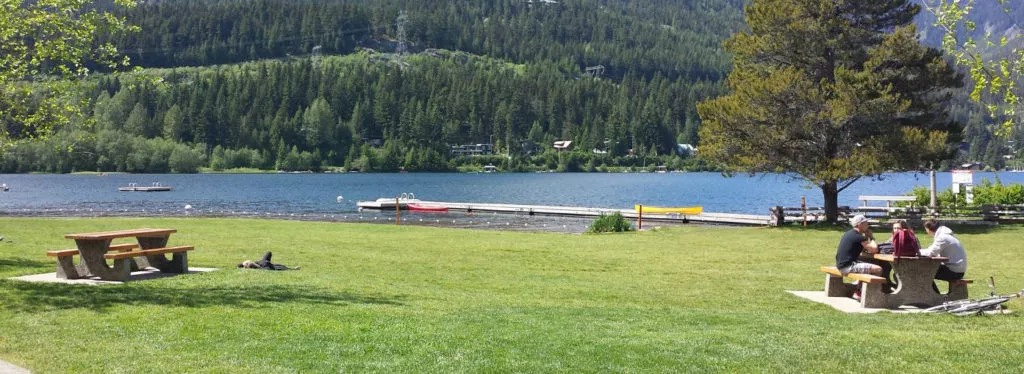 precast concrete picnic tables by the lake on precast base slabs