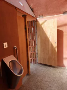 Inside of the precast concrete washroom building door view and urinal Surrey BC
