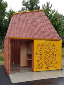 sliding gate with custom art panel for the Precast concrete washroom building in Surrey BC