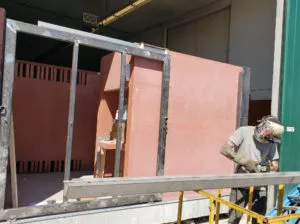 welding the gutter and Gate assembly for precast concrete washroom building surrey BC