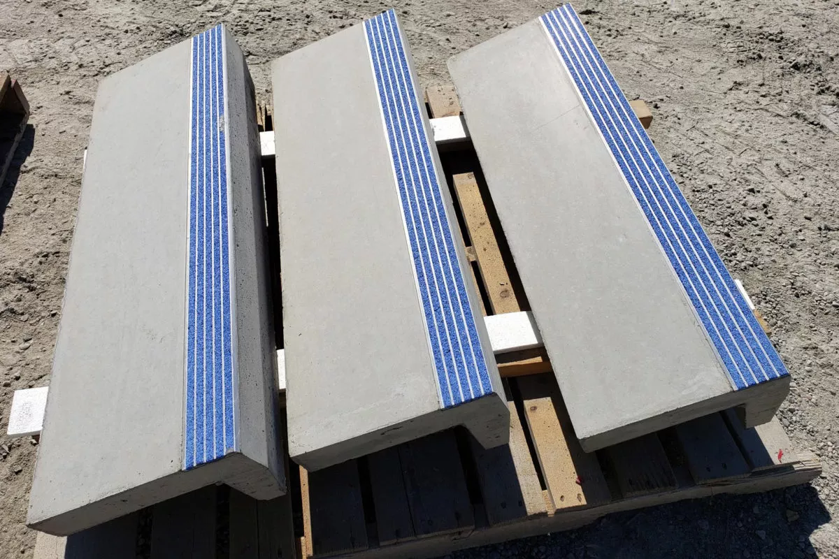 blue carborundum safety strips in precast concrete treads