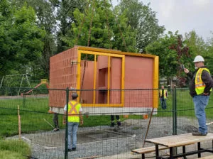 placing the base assembly for the precast concrete public washroom building Surrey BC part 3