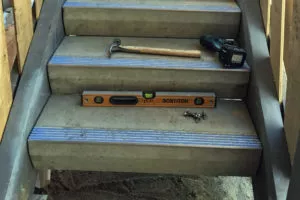 installation of precast concrete stair treads with carborundum nosing