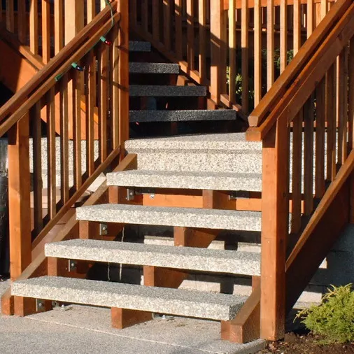 Precast concrete stair treads with cedar stringers and handrails — BC residential