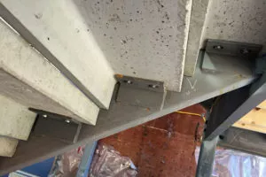 underside of precast concrete stair treads welded into place