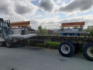 pre assembled benches on cement base slabs ready for delivery to site