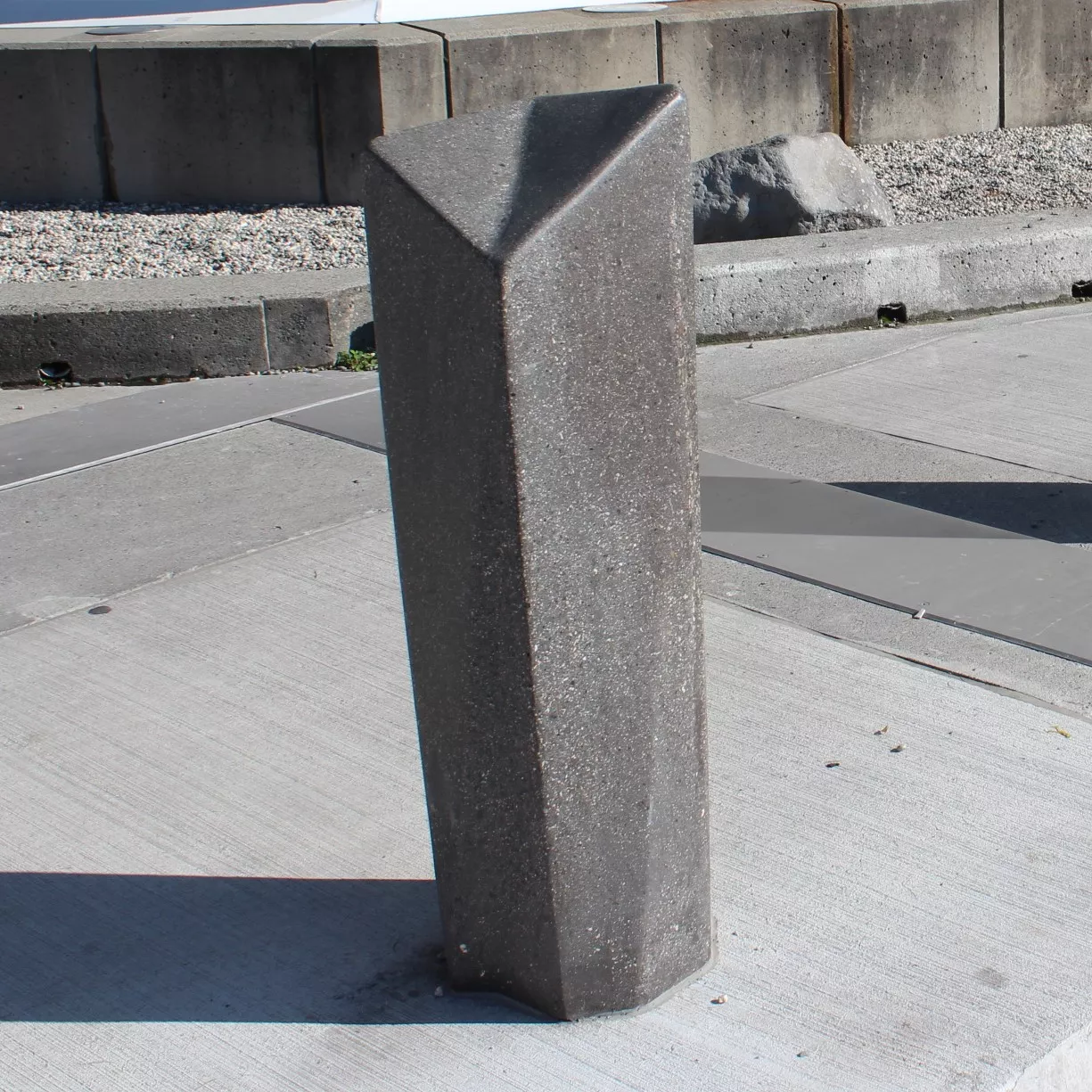 polished black precast concrete security bollards yvr