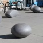 polished precast concrete pebbles security bollards vancouver airport