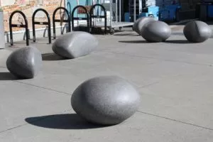 polished precast concrete pebbles security bollards vancouver airport