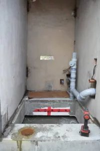 Assembling the toilet wall panel precast concrete washroom building Surrey BC