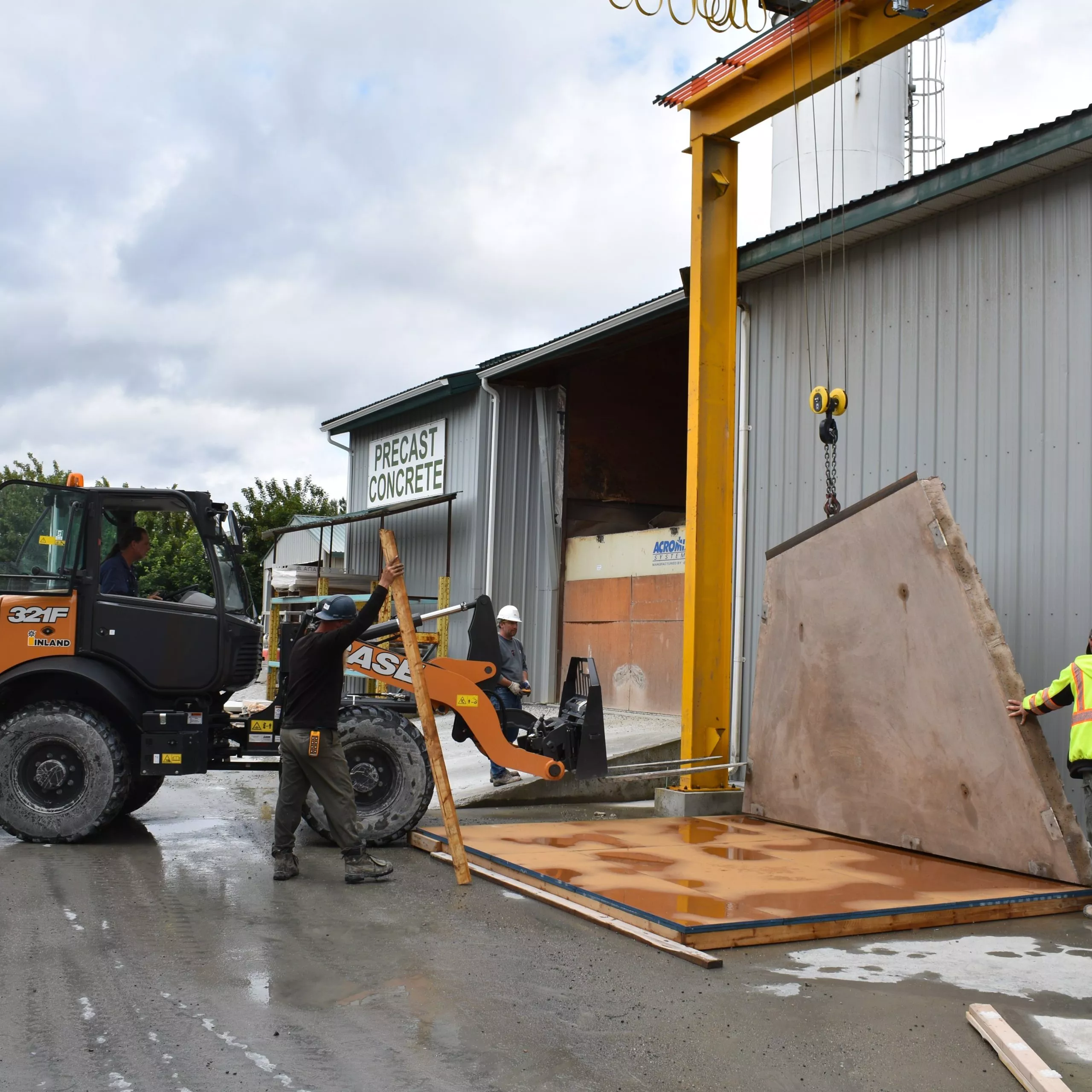 Roof structure being assembled on precast concrete washroom
