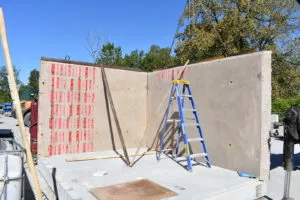 Assembling the exterior walls panel precast concrete washroom building Surrey BC