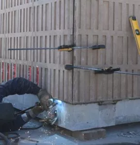 Welding the exterior walls panel precast concrete washroom building Surrey BC