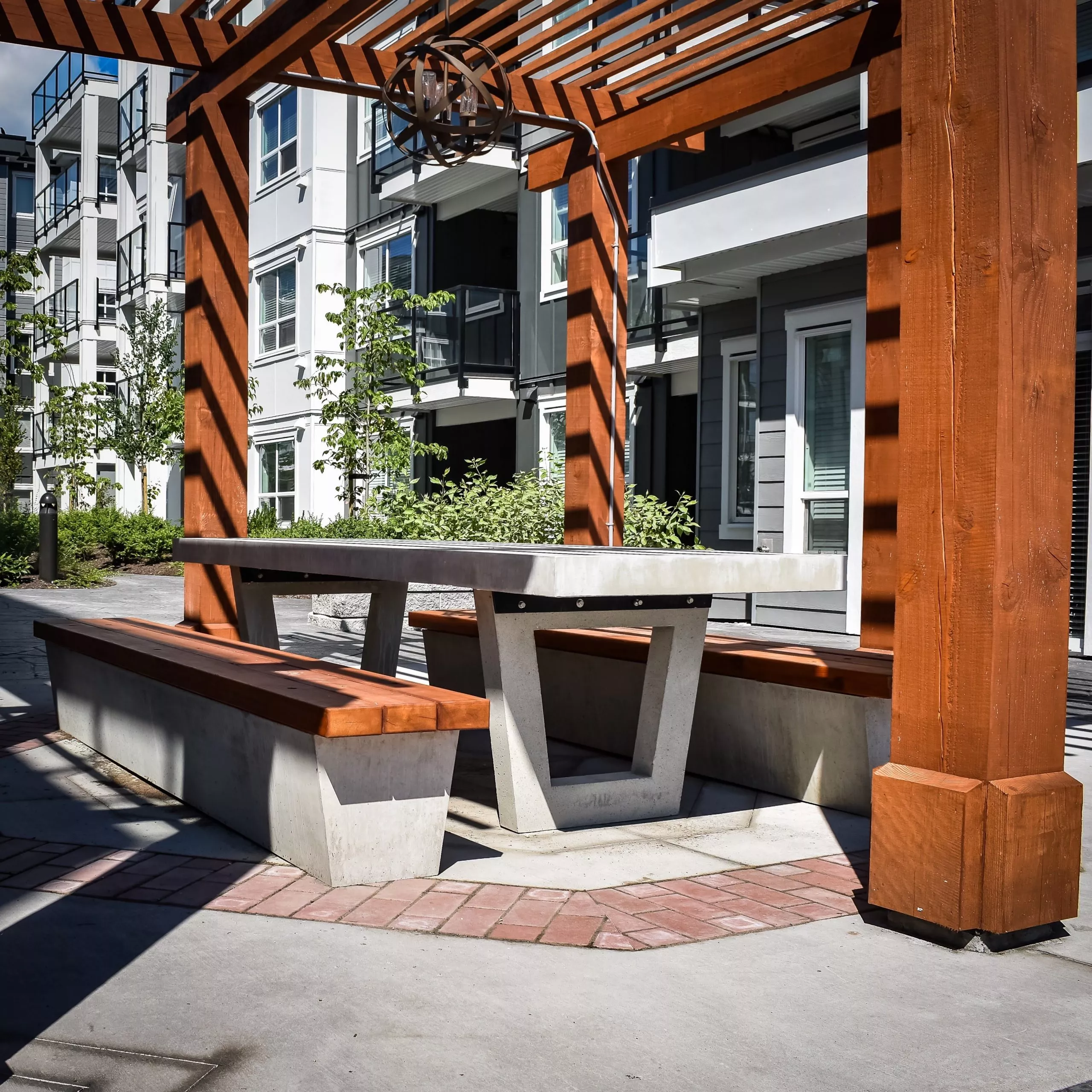 Concrete picnic table with cedar benches