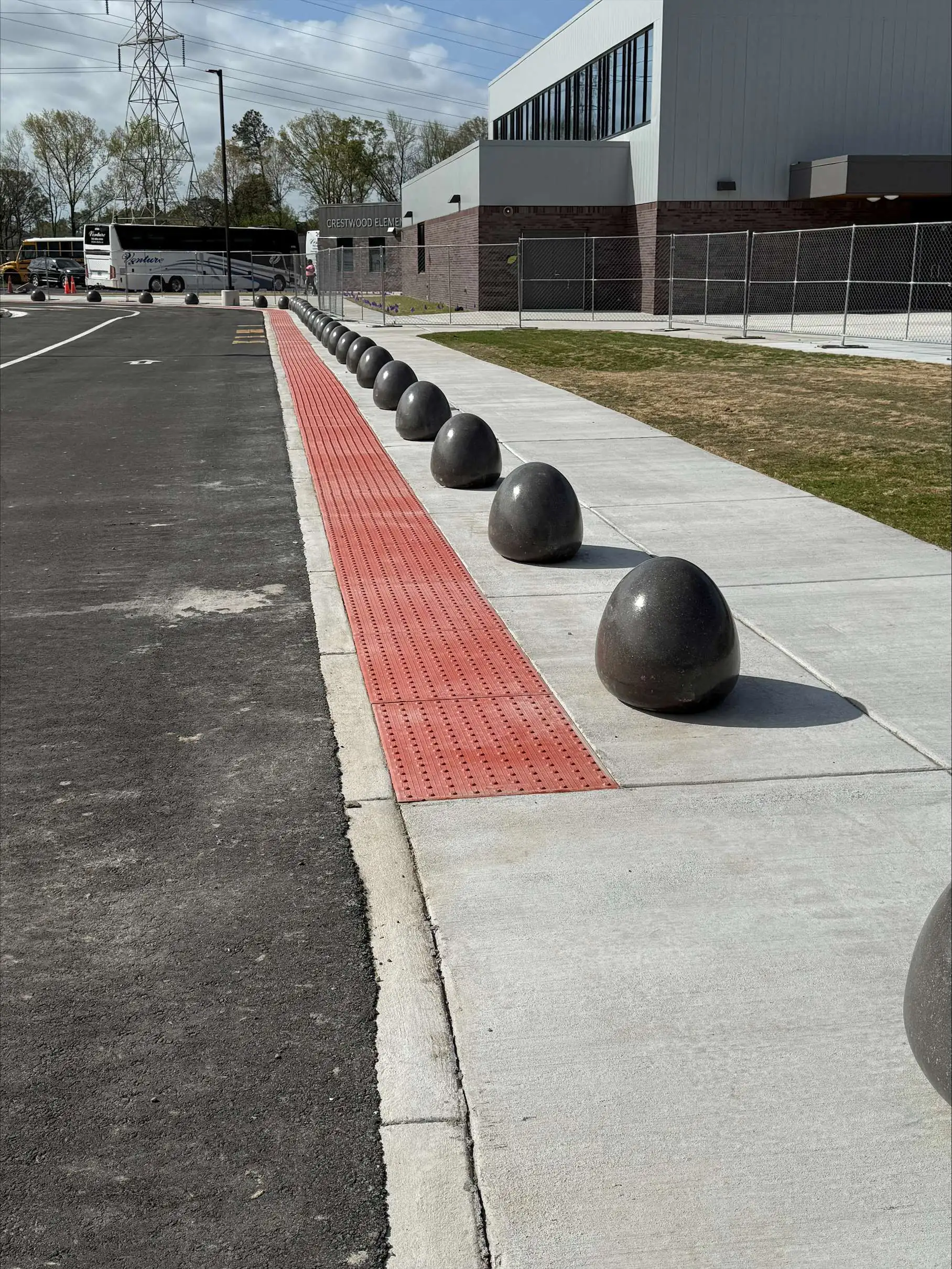 Brown concrete pebbles in an outdoor landscape setting