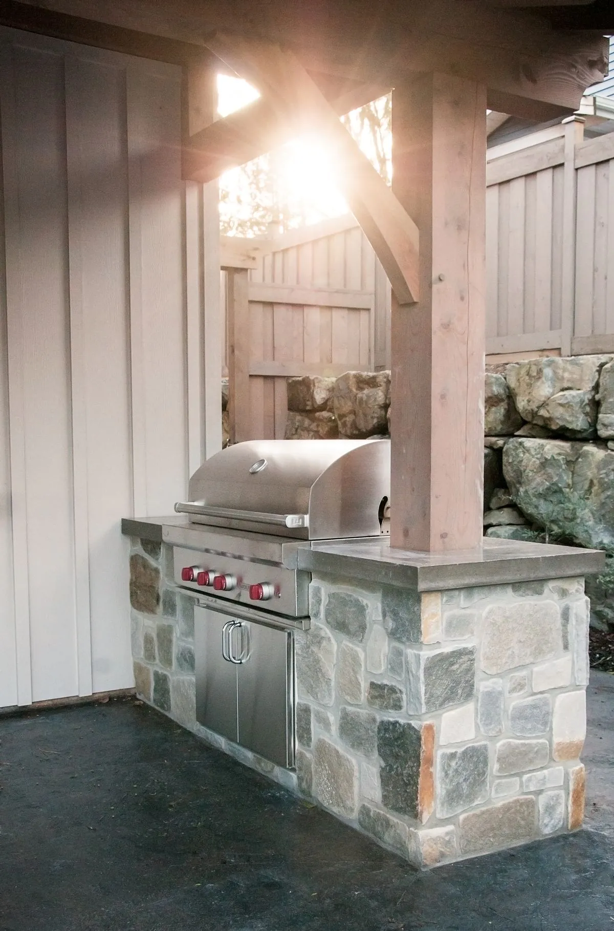 Custom outdoor concrete countertop with built-in BBQ