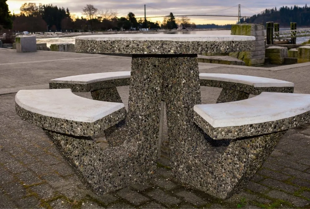 Precast concrete picnic tables in BC waterfront park setting